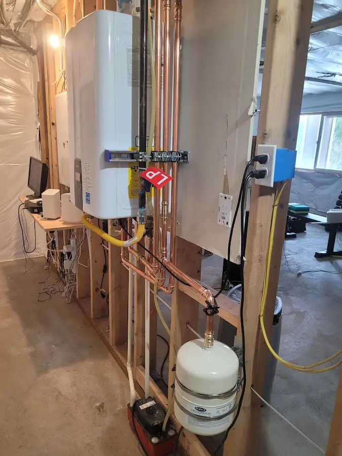 Licensed plumber repairing a kitchen sink in Upper Deerfield