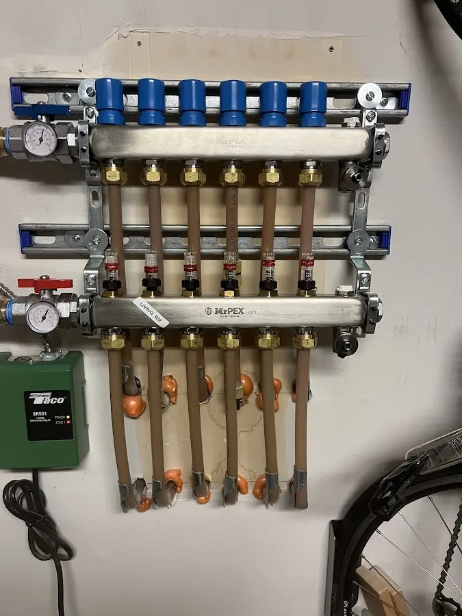 Plumber performing Gas Line Installation at a residential property in Upper Deerfield